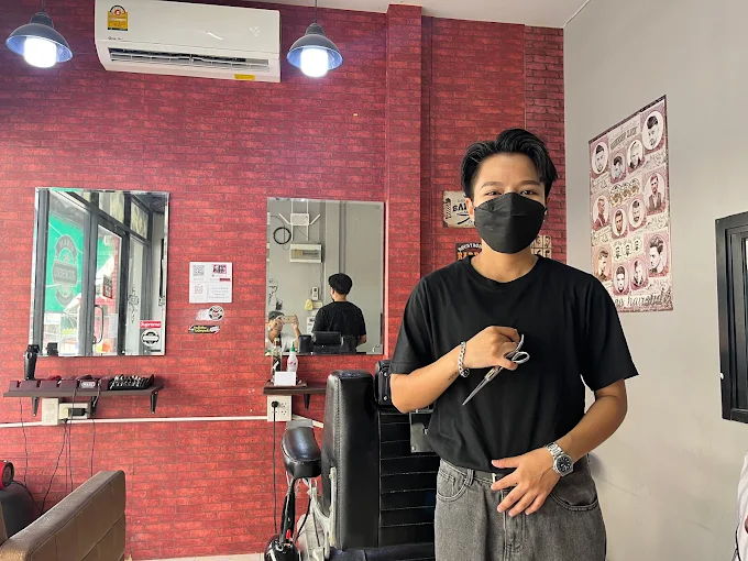 Friendly barber at Undercutz Barbershop in Hua Hin